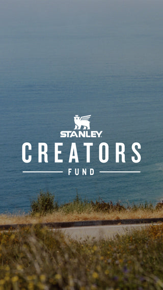 Stanley 1913 Creators Fund promotional graphic with ocean cliff backdrop
